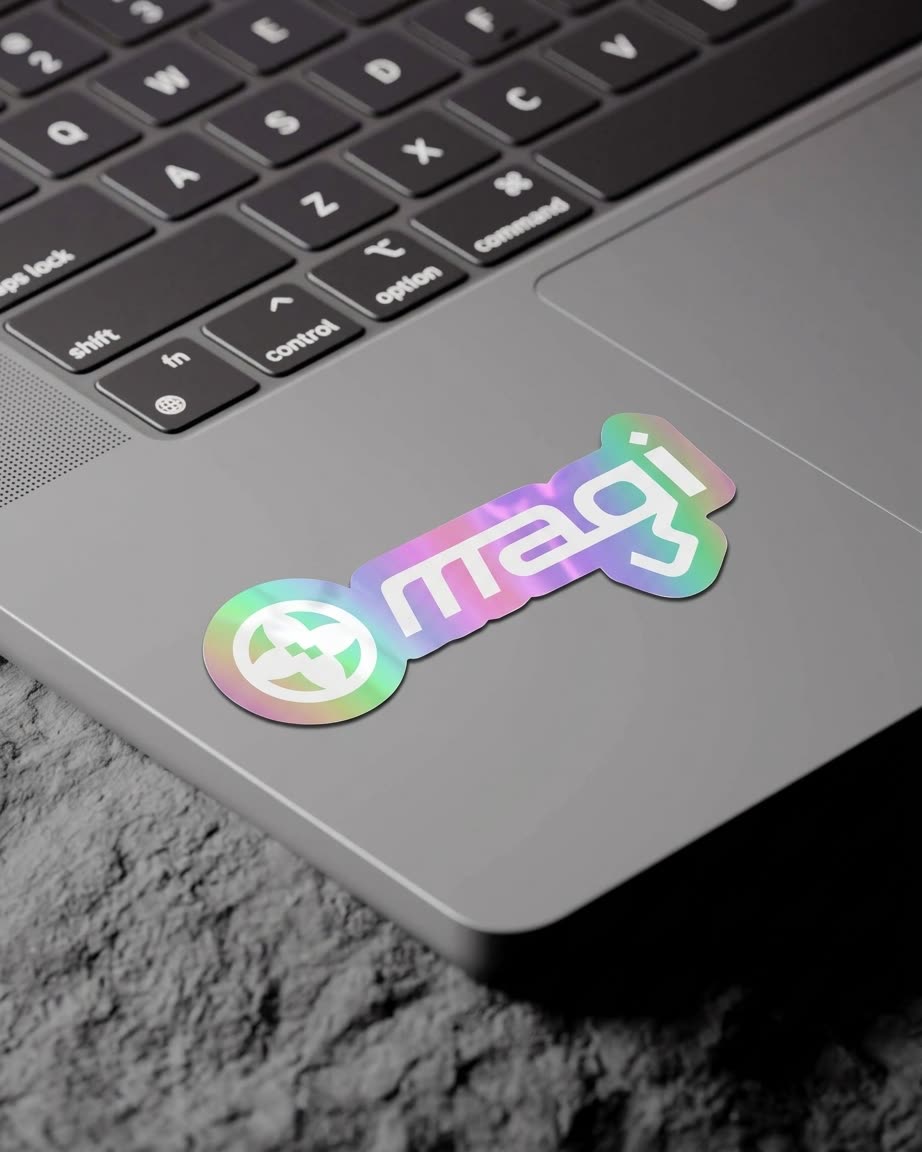 The magi holographic sticker on a laptop palm rest
